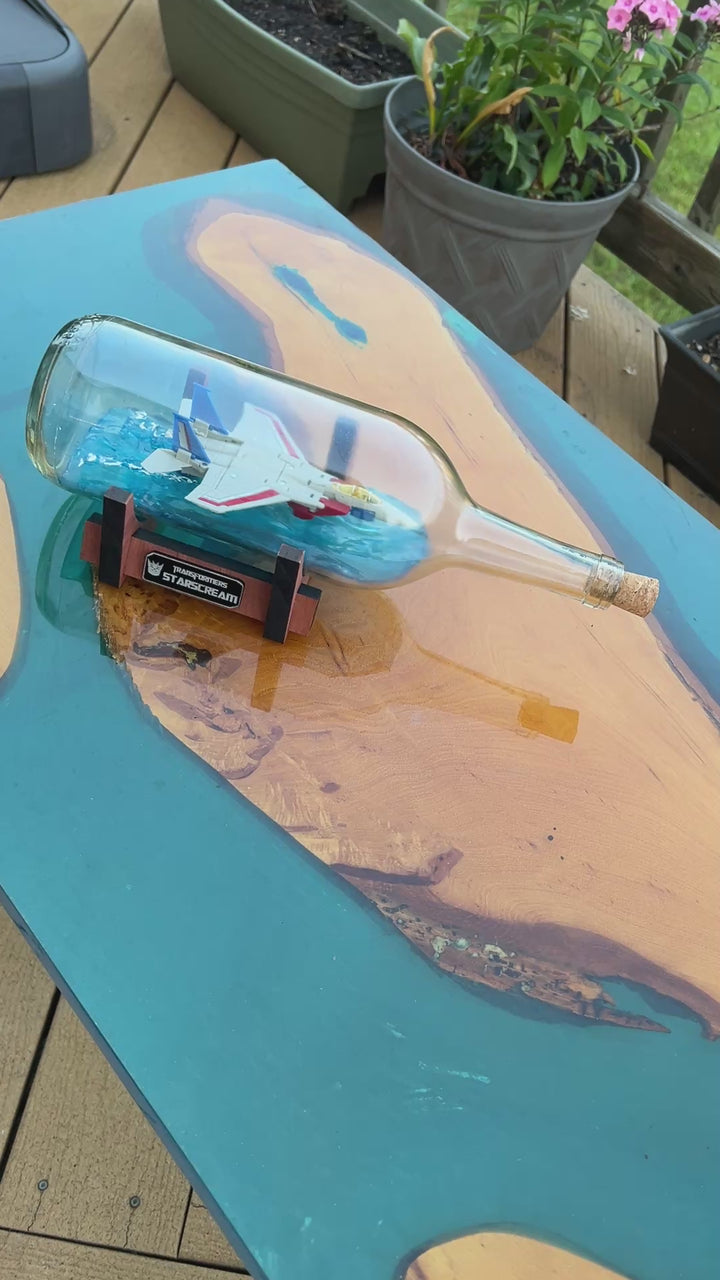Transformers Starscream Over Water Starship in a Bottle